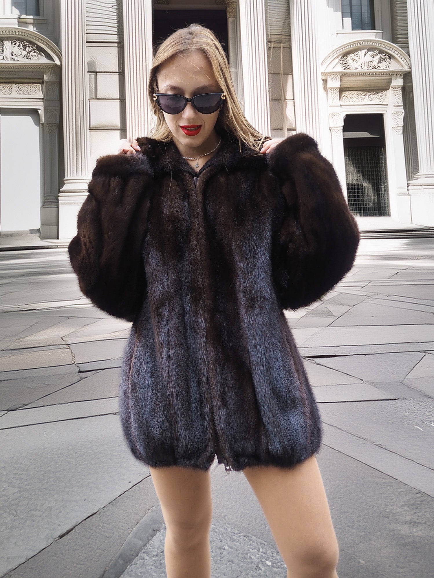 Model poses confidently in Unisex Dark Mahogany Mink Fur Bomber Jacket Coat M/L, highlighting the coat’s dark mahogany hue and soft finish.