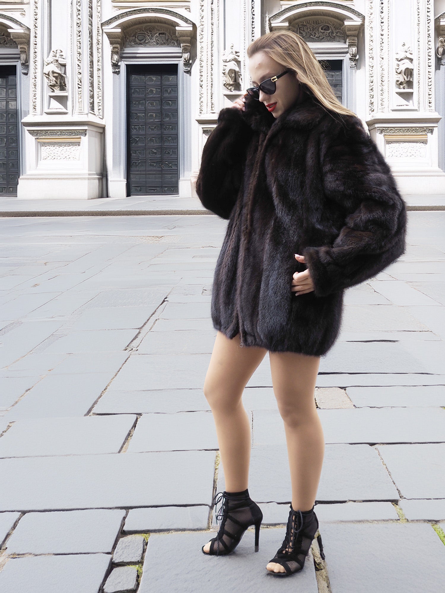 Unisex Dark Mahogany Mink Fur Bomber Jacket Coat M/L styled with black heels, showing its full length and plush fur detail.
