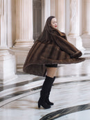 Back view of Brand New Luxurious Demi Buff Swing Canadian Mink Fur Coat L/XL in motion, highlighting its full swing and satin lining.