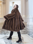 Back twirl of Brand New Luxurious Demi Buff Swing Canadian Mink Fur Coat L/XL, showcasing its voluminous swing and natural fur sheen.