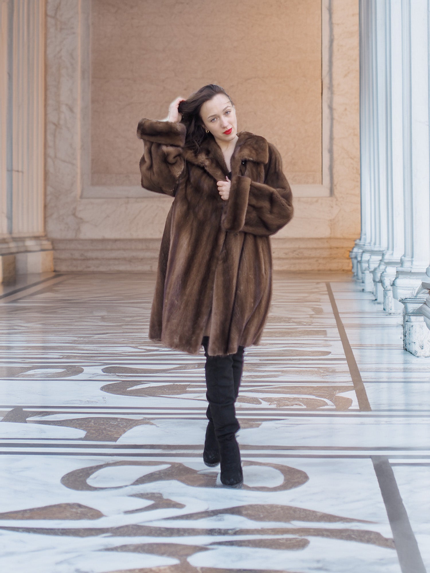 Model posing in Brand New Luxurious Demi Buff Swing Canadian Mink Fur Coat L/XL, styled with black boots in a marble corridor.