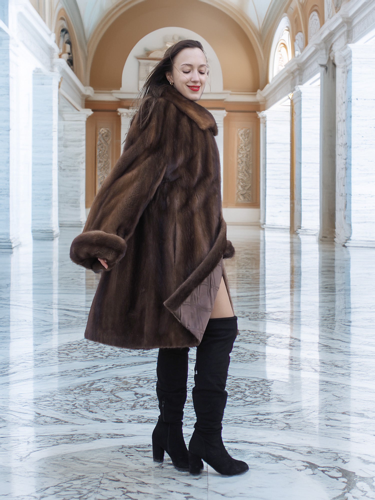 Model turning in Brand New Luxurious Demi Buff Swing Canadian Mink Fur Coat L/XL, showcasing its rich demi buff color and satin lining.