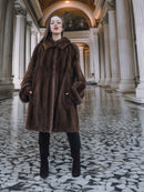 Front view of Brand New Luxurious Demi Buff Swing Canadian Mink Fur Coat L/XL, displayed in a classic architectural setting.