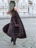 Stylish mahogany mink fur coat with a flowing silhouette, perfect for cold-weather sophistication. A luxurious statement piece.