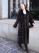Elegant mahogany mink fur coat with a rich texture and deep brown hue. A perfect choice for cold-weather luxury.