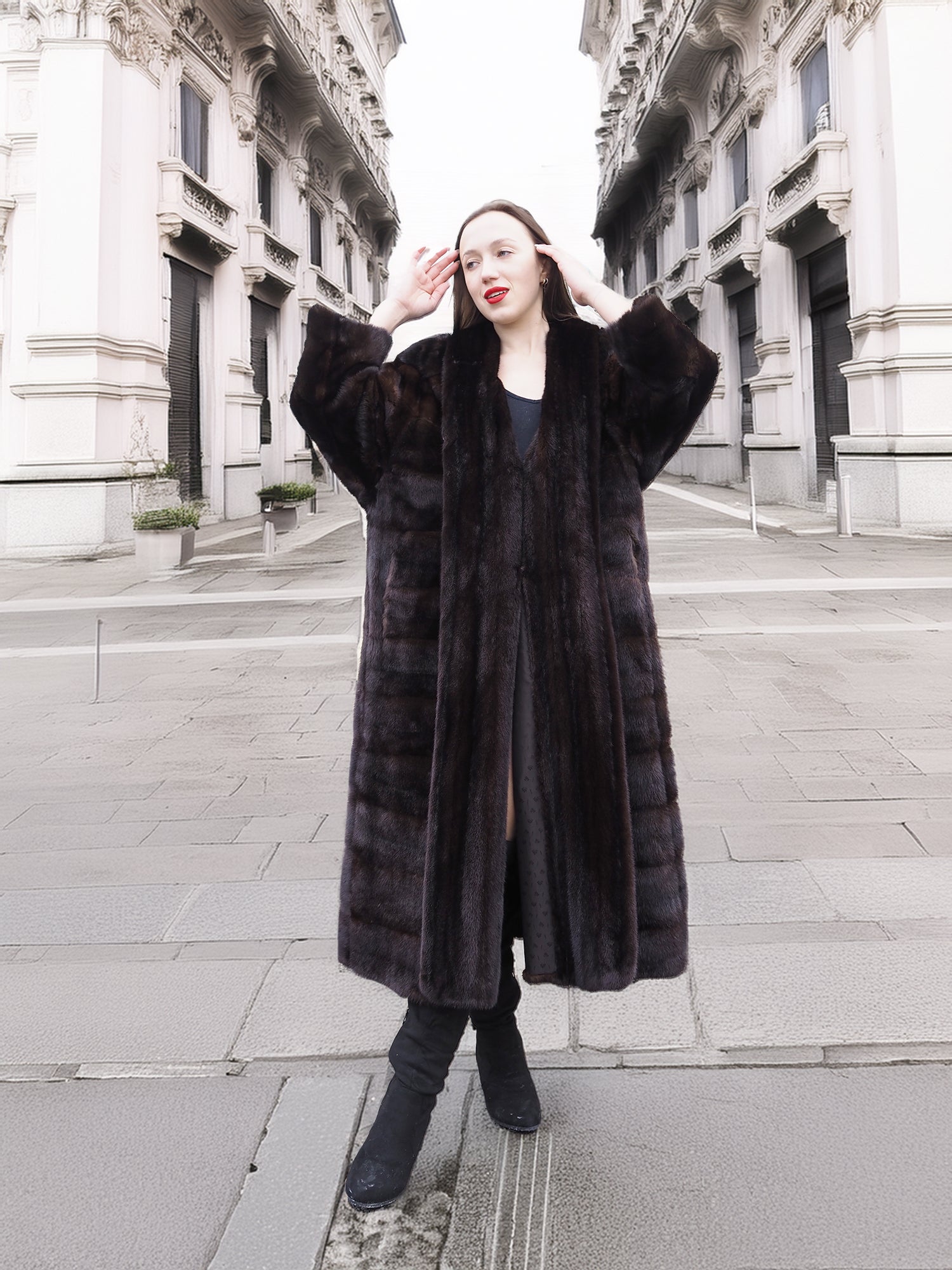 Full-length mahogany mink fur coat with a dramatic silhouette, exuding sophistication and warmth. A timeless winter essential.