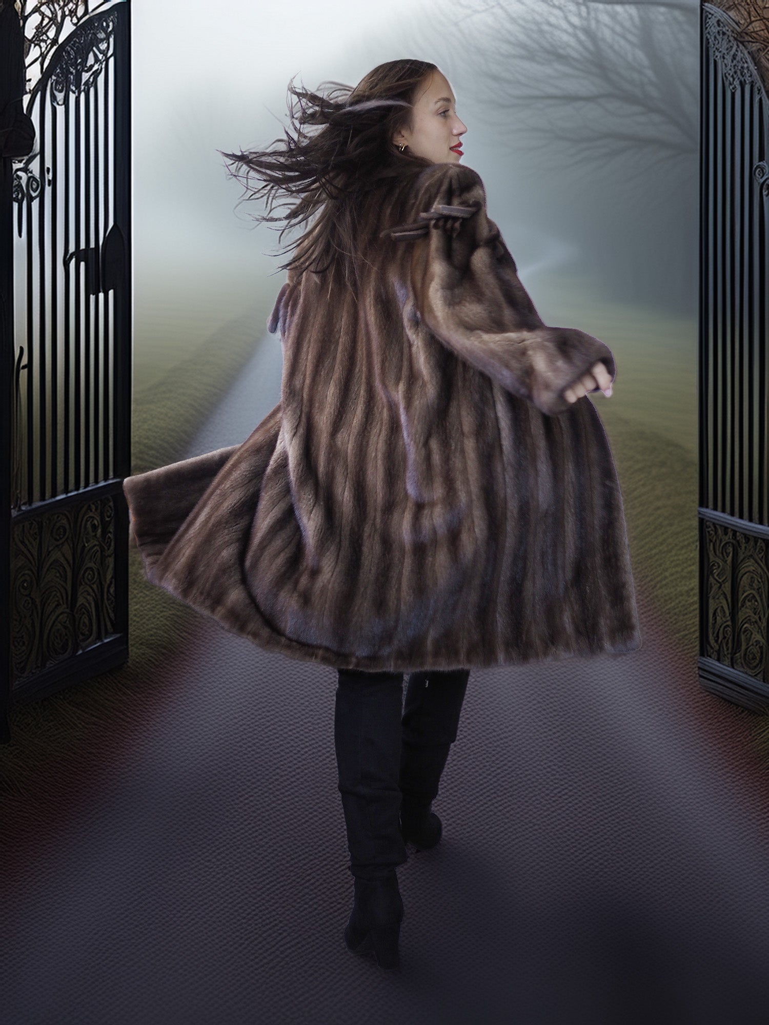 Person wearing a fur coat walking through an ornate gate.