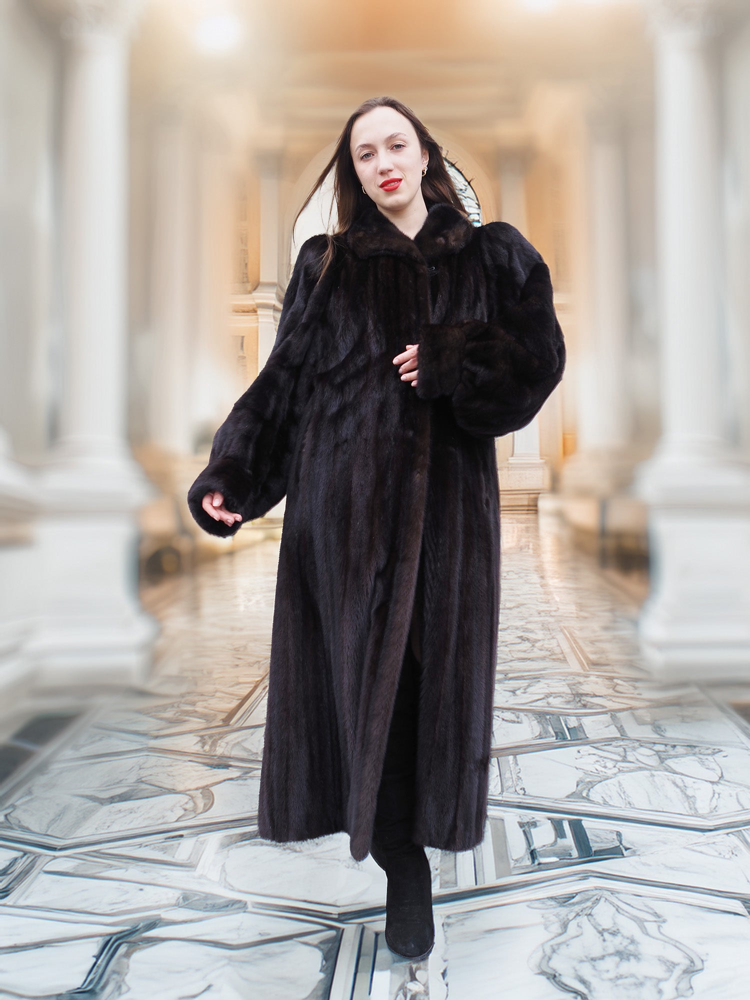 Model walks confidently in full-length black mink fur coat, showcasing cinematic elegance and modern allure in luxury outerwear.