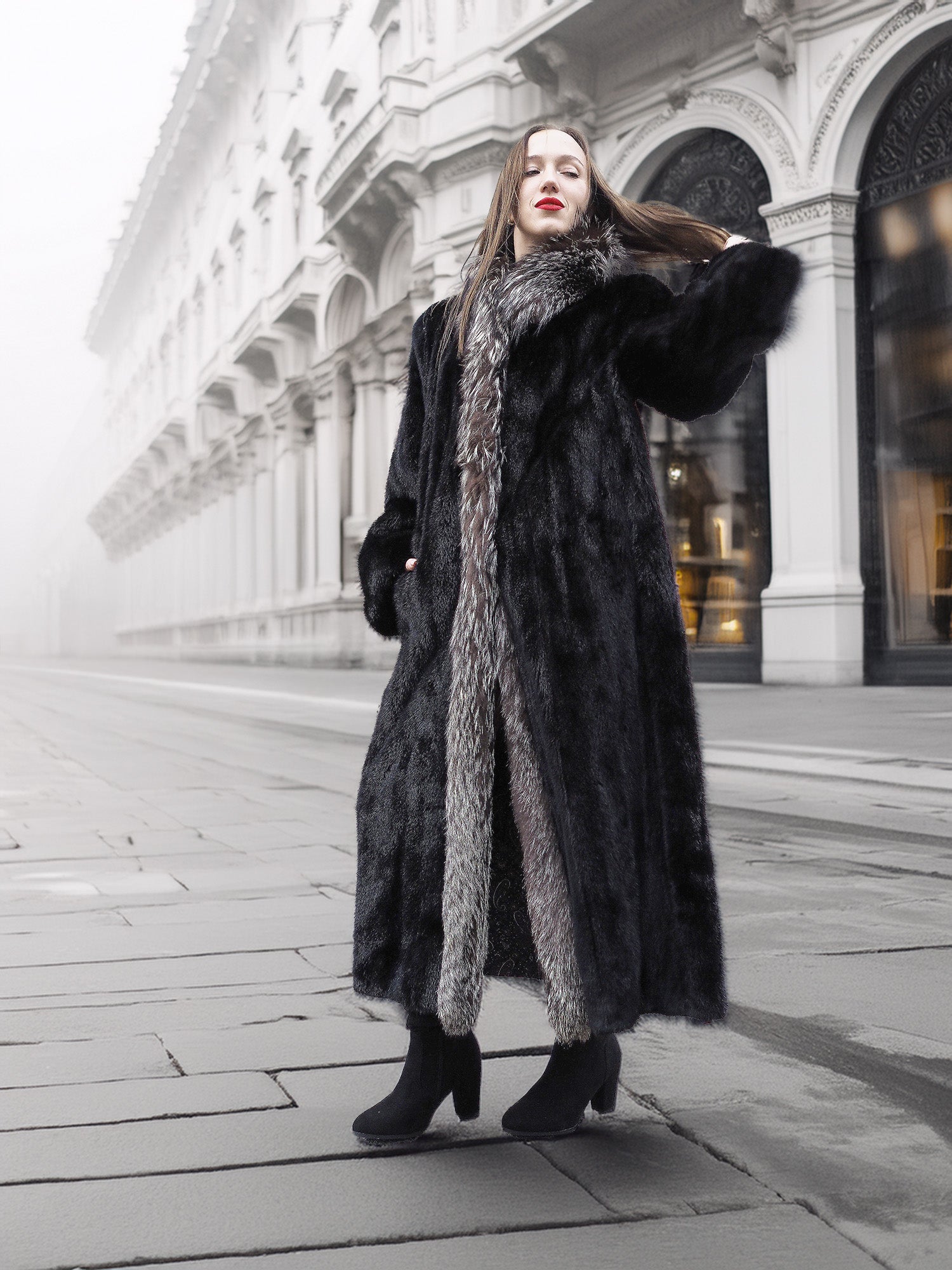 Full-length black mink coat with indigo fox collar, ideal for luxury winter fashion in medium to large sizes.