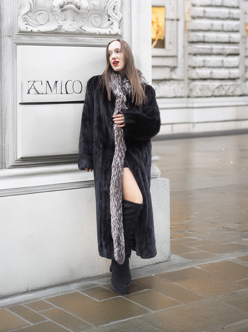 Chic black mink fur coat with silver fox collar, styled with thigh-high boots for a bold winter streetwear look in L/XL.