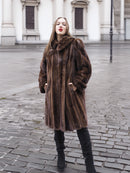 Pre-owned dark mahogany mink fur coat with classic collar and pockets, perfect for medium-sized women seeking timeless fashion.
