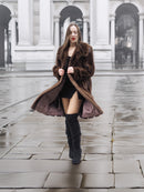 Model in dark mahogany vintage mink fur coat with satin lining, ideal for stylish winter wear in the outerwear apparel category.