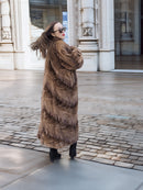 Espresso Mink Long Coat - Regal Swing from behind, showing elegant swing movement and luxurious mink fur detail in a city setting.