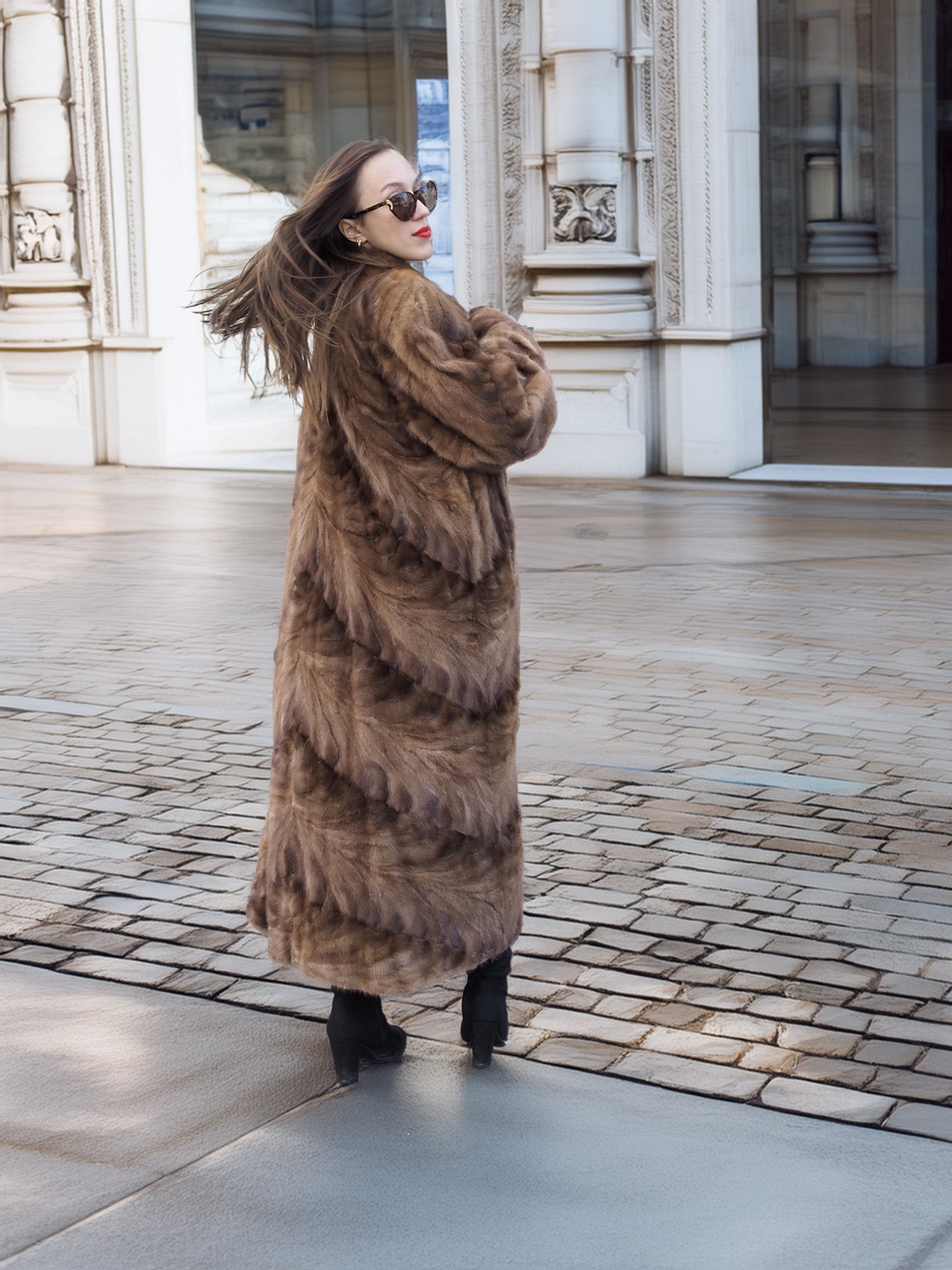 Espresso Mink Long Coat - Regal Swing from behind, showing elegant swing movement and luxurious mink fur detail in a city setting.