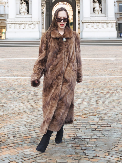 Espresso Mink Long Coat - Regal Swing walking across plaza, showcasing natural mink texture and luxurious full-length design.