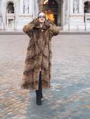 Espresso Mink Long Coat - Regal Swing worn in a grand plaza, showcasing full-length fur and dramatic winter fashion styling.