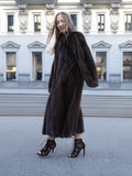 Walking in a mink fur coat, city scene