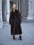 Woman wearing luxurious mink fur coat