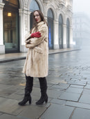 Beige Mink Fur Coat - Vintage Luxury worn with black boots and red gloves. Timeless fur coat for sophisticated winter looks.