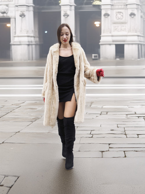 Beige Mink Fur Coat - Vintage Luxury worn over black mini dress. Elegant outerwear for upscale winter styling.