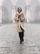 Beige Mink Fur Coat - Vintage Luxury buttoned up in city square. Medium size mink coat for classic winter style.