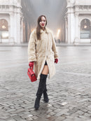 Vintage Beige Pearl Mink Fur Coat S/M styled with thigh-high boots. Elegant and warm outerwear for city strolls.