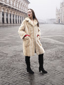 Vintage Beige Pearl Mink Fur Coat S/M with hands in pockets. Luxurious mink fur coat for stylish winter wear.