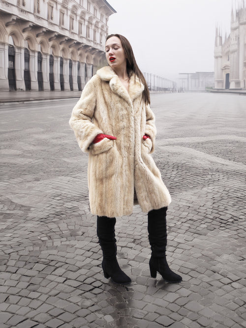 Vintage Beige Pearl Mink Fur Coat S/M with hands in pockets. Luxurious mink fur coat for stylish winter wear.