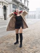 Beige Mink Fur Coat - Vintage Luxury open to reveal black mini dress. Stylish layering piece for upscale winter outfits.