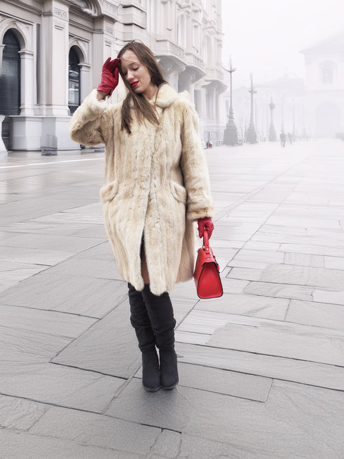 Vintage Beige Pearl Mink Fur Coat S/M paired with red handbag and gloves. Classic mink coat for chic cold-weather street style.