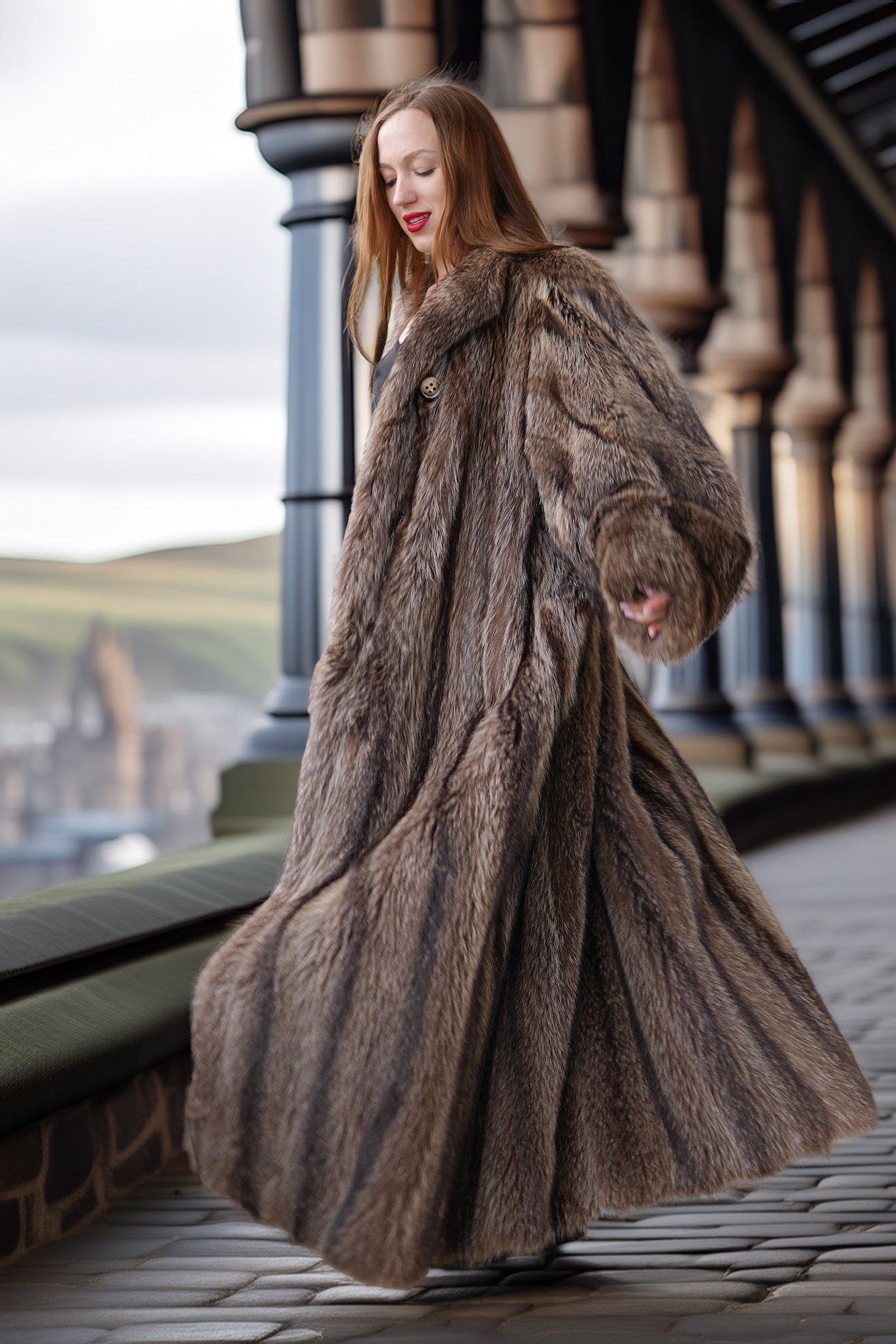 Woman wearing a fur coat standing on a balcony with a scenic background
