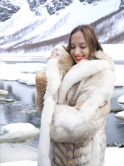 Elegant coyote fur coat with white trim