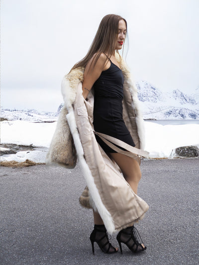 Model in luxurious coyote fur coat