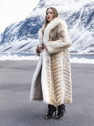 Coyote fur coat with shawl collar in snow