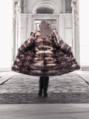 Horizontal fur coat, dark brown-and-tan plaid pattern, full length with hooded collar