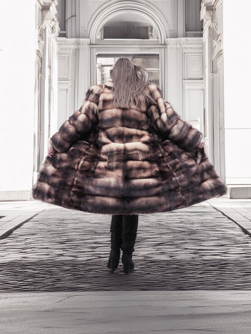 Horizontal fur coat, dark brown-and-tan plaid pattern, full length with hooded collar