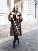 Vintage fur coat with large fur collar, dark brown and tan stripes, front view
