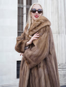 Vintage pastel Canadian brown mink fur coat with oversized collar and cuffs. Elegant stroller style design in a luxurious, fashionable look.