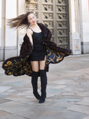 Gold baroque lining of mahogany mink swing coat XL/XXL shown mid-spin. Luxury fur coat with dramatic flair for winter fashion.