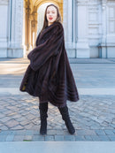 Mahogany mink swing coat XL/XXL with flared hem and soft texture. Elegant fur fashion for upscale winter wardrobes.