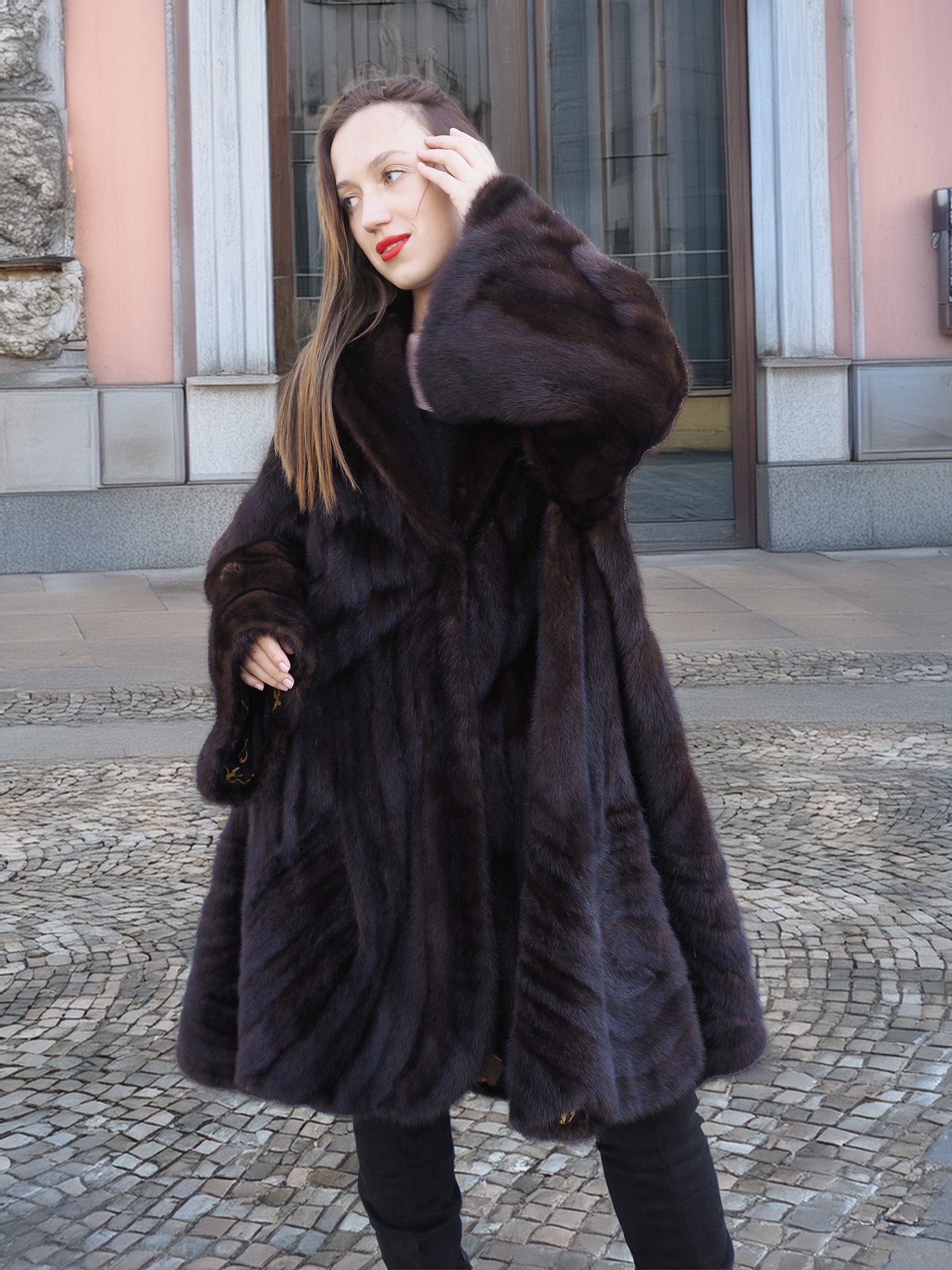 Side view of mahogany mink swing coat XL/XXL with soft fur texture and flared sleeves. Real fur coat for upscale winter style.