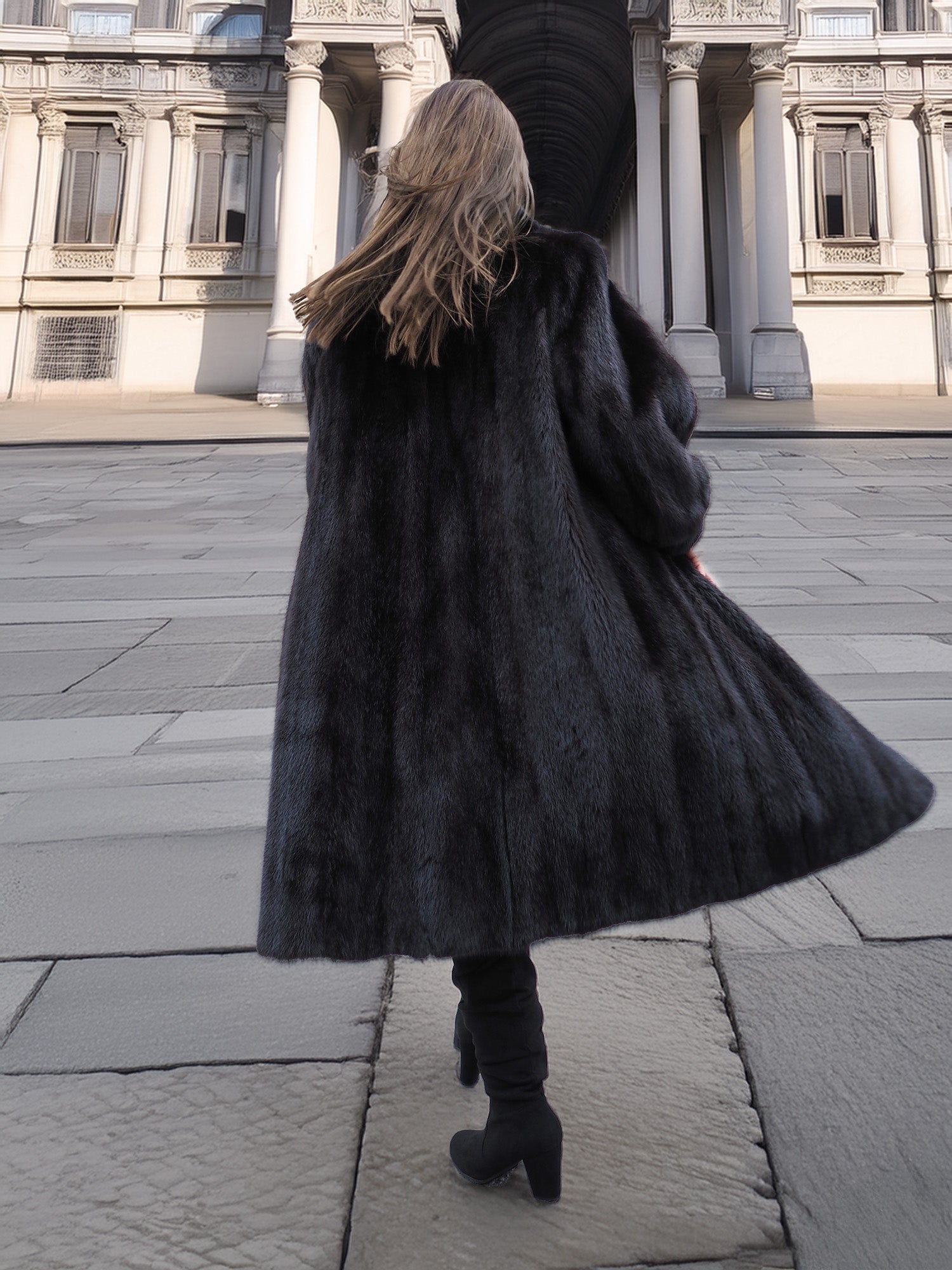 Back view of flowing black mink fur coat in motion, emphasizing luxurious volume and natural fur texture.