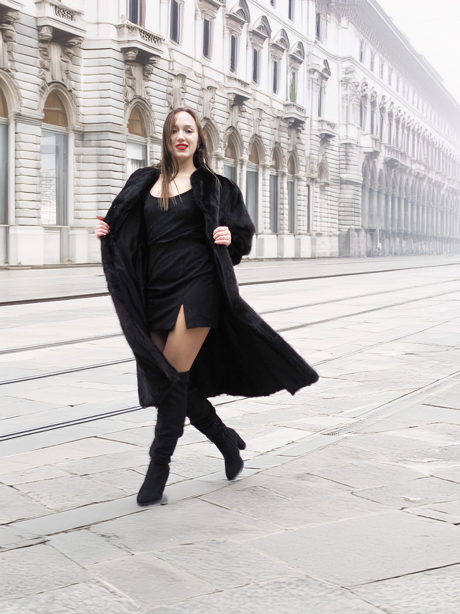 Model in black mink fur coat walking confidently, highlighting the coat’s elegant flow and premium craftsmanship.