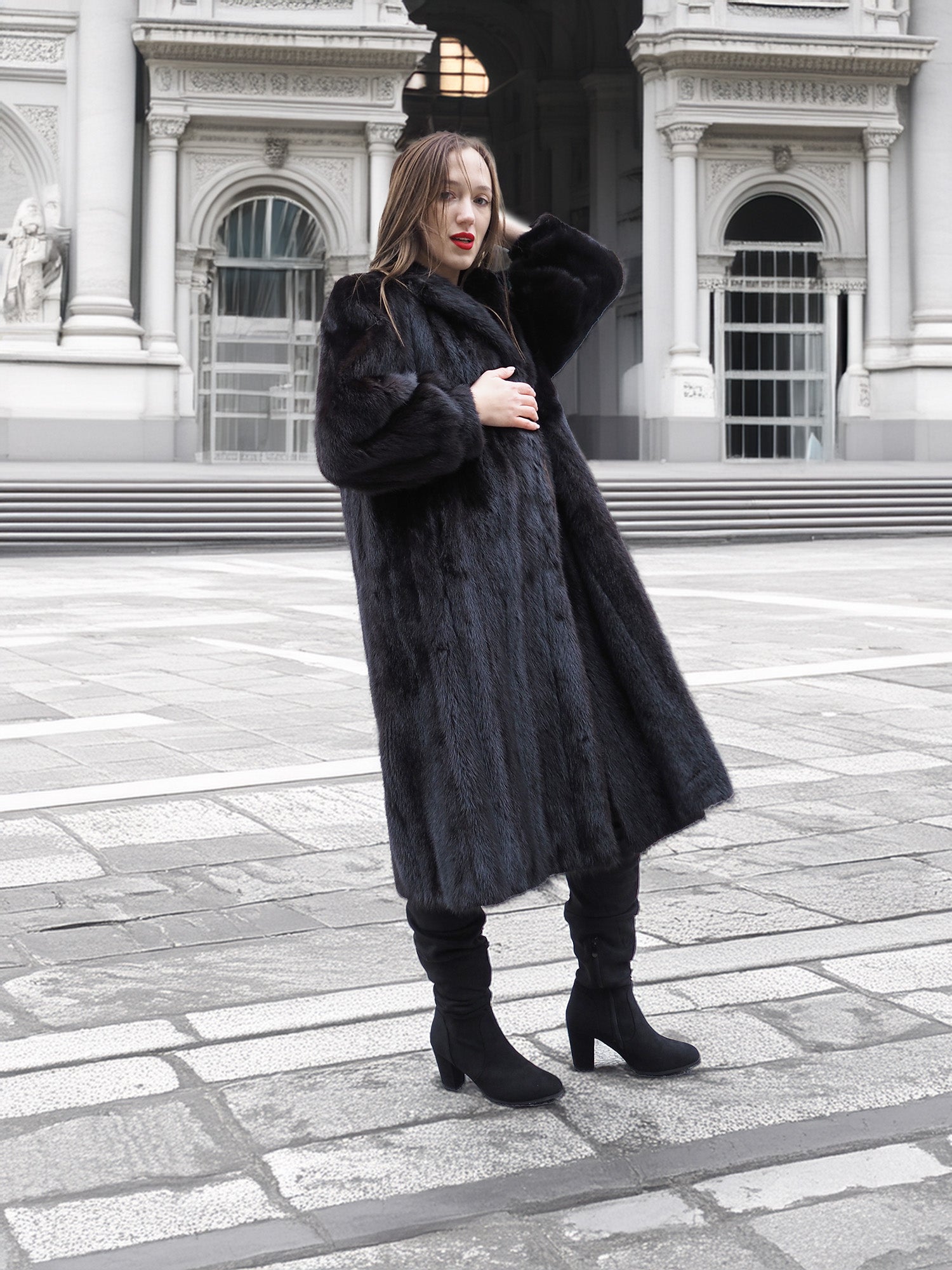 Elegant black mink fur coat with wing collar and plush sleeves, styled for luxury winter fashion and fur outerwear.