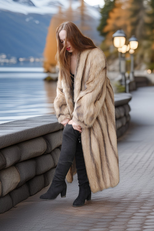 Ivory full-length raccoon coat, open front, long sleeves, side view