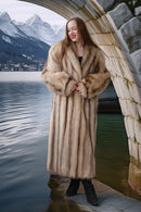 Ivory platinum raccoon coat, front view with belted look and long sleeves