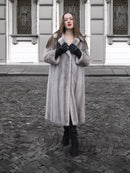 Sapphire Grey Mink Fur Coat S/M Excellent displayed in a front view. Elegant fur coat with plush texture, ideal for upscale winter outerwear collections.