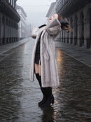 Sapphire Grey Mink Fur Coat S/M Excellent in a joyful pose. Luxurious fur coat with soft pastel tones and vintage-inspired winter fashion.