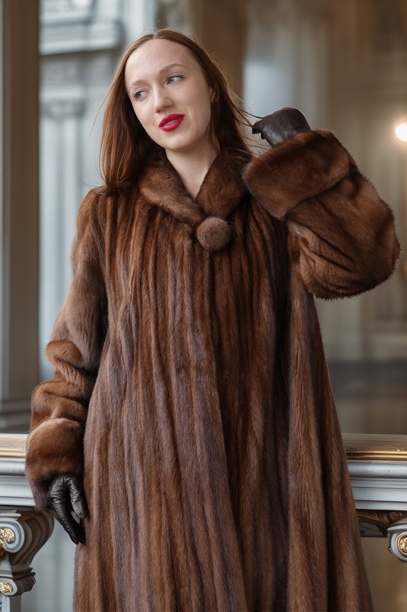 Brown mink fur coat close-up with rounded collar and fuzzy sleeve cuffs