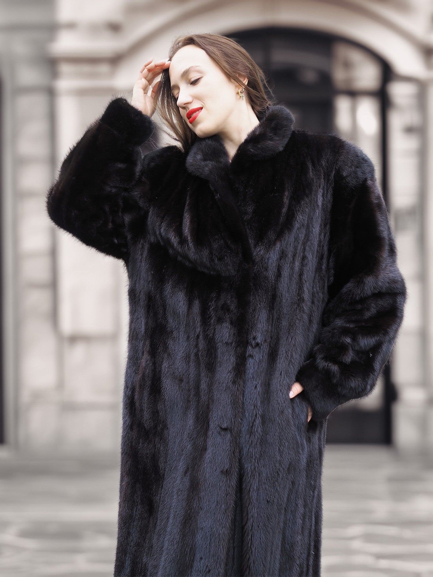 Close-up of Midnight Sonata black mink coat for women, featuring plush fur texture and classic collar for winter elegance.